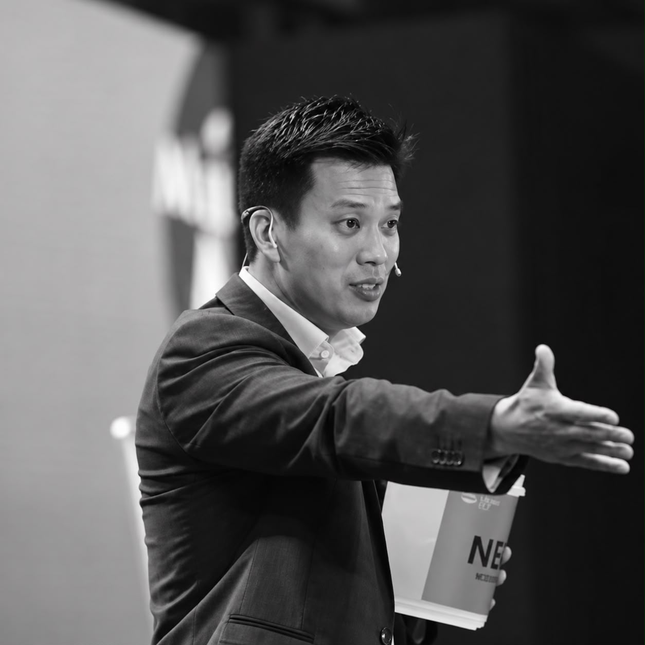 Dr. Michael Lee speaking at an event